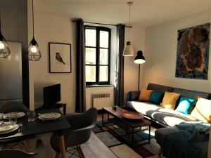 Appartements Appartement sous les remparts : photos des chambres