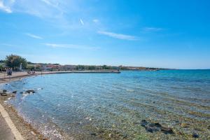 Apartments by the sea Vir - 12707