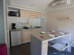 Campings Camping Mobile Home U sole marinu : photos des chambres