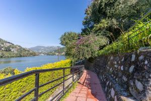 SaffronStays Gardens on the Lake - 2BR pet & elderly-friendly lakefront villa with lawns, bonfire & kitchenette near Nainital