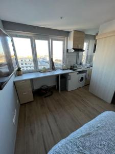 Appartements Super studio en face de la gare de mulhouse : photos des chambres