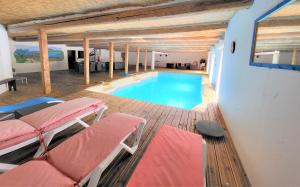 Maisons de vacances Grande maison familiale avec piscine couverte : photos des chambres