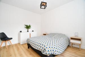 Appartements T2 Cosy en centre-ville proche du lac avec balcon : photos des chambres