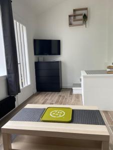 Appartements Appartement cosy avec jardin en centre-ville : photos des chambres