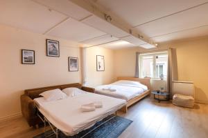 Appartements CABANA & Le petit Marronnier : photos des chambres