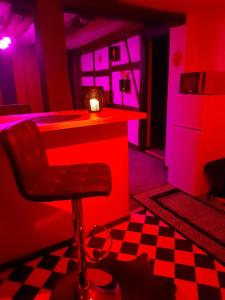 Appartements LOVE ROOM Le rouge et noir : photos des chambres