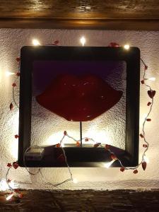 Appartements LOVE ROOM Le rouge et noir : photos des chambres