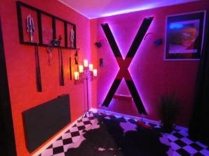 Appartements LOVE ROOM Le rouge et noir : photos des chambres