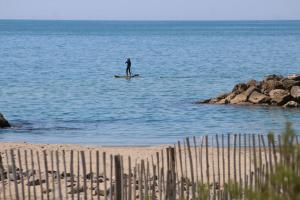 Villas Villa Tout confort les pieds dans l’eau ! Clim / parking : photos des chambres