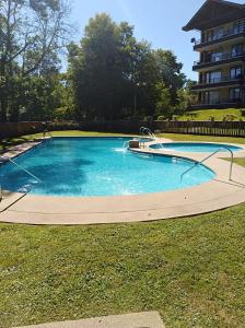 CONDOMINIO LOS CASTAÑOS ALICURA, PUCÓN, departamento 2 dormitorios, 1 baño, estacionamiento, piscina