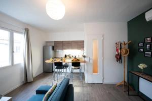Appartements Appartement centre village, clim et parking gratuit : photos des chambres