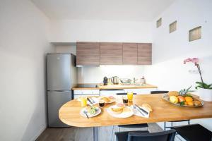 Appartements Appartement centre village, clim et parking gratuit : photos des chambres