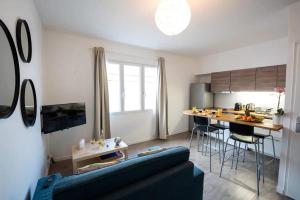 Appartements Appartement centre village, clim et parking gratuit : photos des chambres