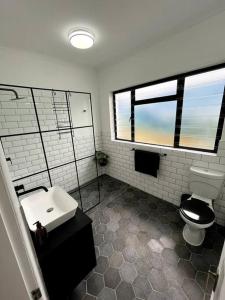 Centrally located modern 2-bedroom home & parking