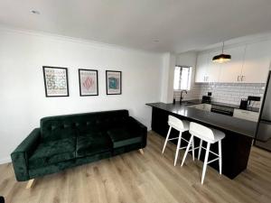 Centrally located modern 2-bedroom home & parking