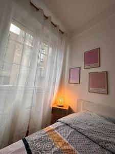 Appartements Somptueux T3 Coeur de ville avec Balcon : photos des chambres