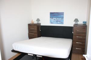 Appt les pieds dans leau