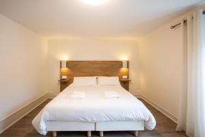 Appartements Les Arenes - 2 chambres - Climatise avec Balcon : photos des chambres