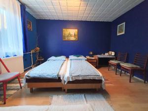 Triple Room room in Pereszlényi Vendégház