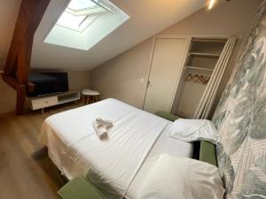 Appartements Rollin 7 YourHostHelper : photos des chambres