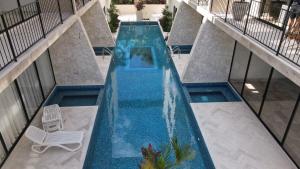 2BR with Fast WiFi FREE BIKES, Rooftop, Pool, and Gym