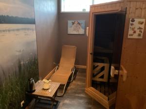 Appartements Les 4 flocons, avec piscine exterieure chauffee a 100m du lac et du centre , wifi, parking, sauna : photos des chambres