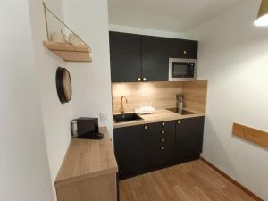 Appartements Snowliday - Appartement Renove en residence 4* pour 4 pers. Valmeinier 1900 : photos des chambres