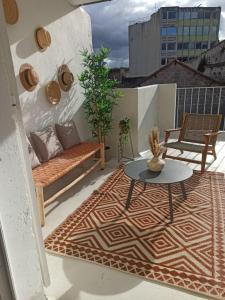 Appartements Grand T3 rue pietonne bureau et terrasse : photos des chambres