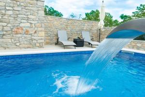 Stone villa Didovi Snovi with heated pool