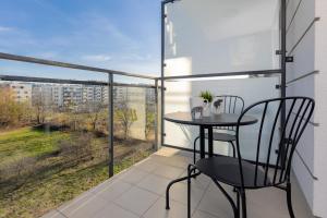 Warsaw Young City Apartment by Noclegi Renters