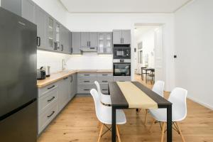 Modern Penthouse in a Century Old Building- 2 BR- AC