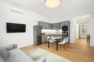 Modern Penthouse in a Century Old Building- 2 BR- AC