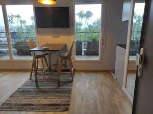 Studio avec terrasse proche des transports.
