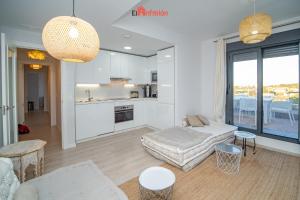 El Anfitrión - Barra del río