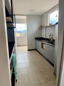 Lindo apartamento em frente a UFOP com garagem