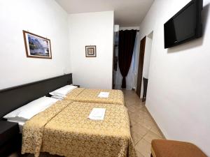 Camera Doppia con Letti Singoli con Bagno Privato