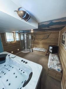 Maisons d'hotes Spa 166 jets, studio prive « bord de mer «  : photos des chambres