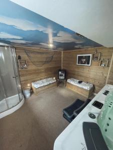 Maisons d'hotes Spa 166 jets, studio prive « bord de mer «  : photos des chambres