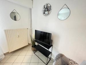 Appartements Vue sur Jardin Parking Ascenseur Un-Sejour-a-Part : photos des chambres