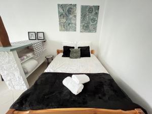 Appartements Vue sur Jardin Parking Ascenseur Un-Sejour-a-Part : photos des chambres