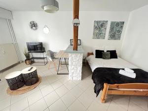 Appartements Vue sur Jardin Parking Ascenseur Un-Sejour-a-Part : photos des chambres