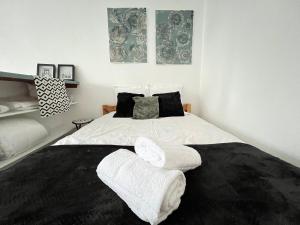 Appartements Vue sur Jardin Parking Ascenseur Un-Sejour-a-Part : photos des chambres