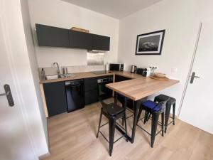 Appartements Le Cote Cour : photos des chambres