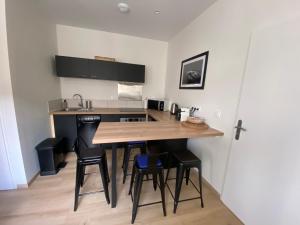 Appartements Le Cote Cour : photos des chambres