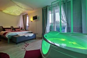 Appartements Nuit Romantique avec Jacuzzi a 15 min de Toulouse : photos des chambres