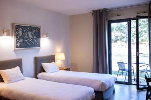 Hotels Hotel Le Patio Occitan : photos des chambres