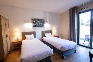 Hotels Hotel Le Patio Occitan : Studio Lits Jumeaux