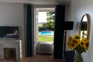 B&B / Chambres d'hotes La plaine de l'Angelus : Hébergement Anémone