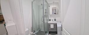 Appartements Petite maison cosy dans un jardin. : photos des chambres