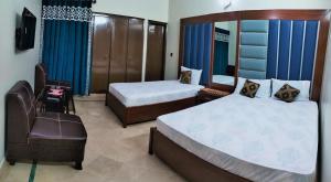 Deluxe Twin Room room in SUBHAN PALACE Near Lasania Restaurant & Millennium Mall